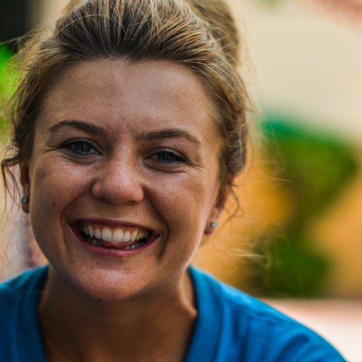 A client relations director discussing corporate gifting strategy with business clients